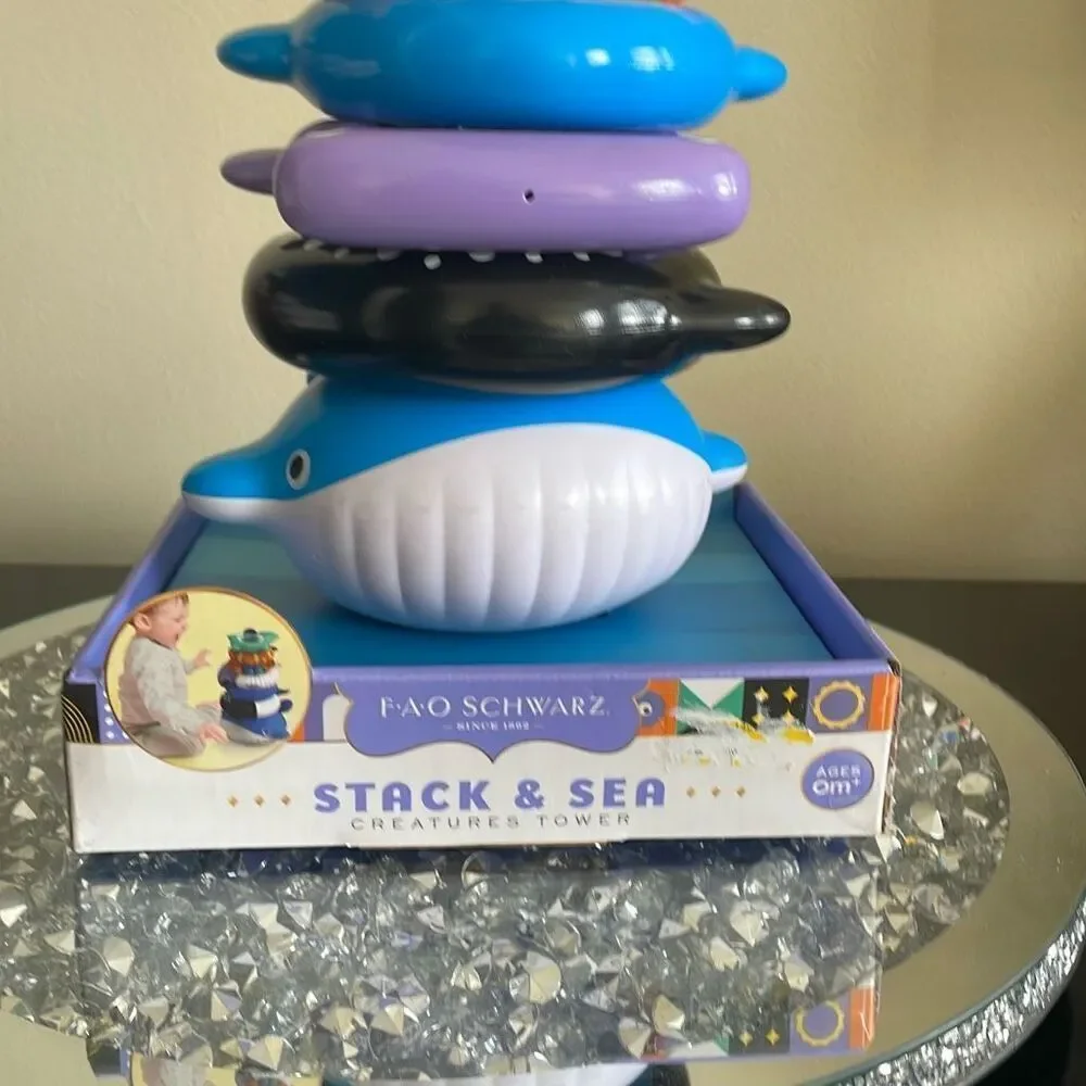 Preowned cute FAO Schwartz stack & sea creature tower 0 month unisex baby toys